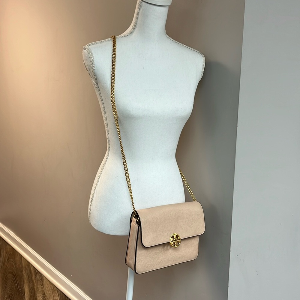 Tory Burch purse with two straps.